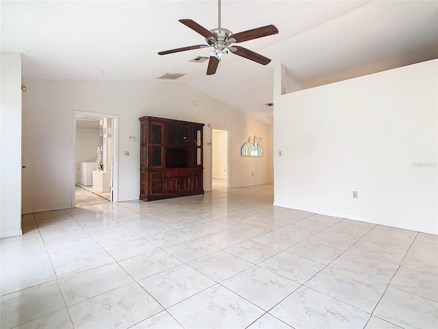 empty room with ceiling fan and lofted ceiling