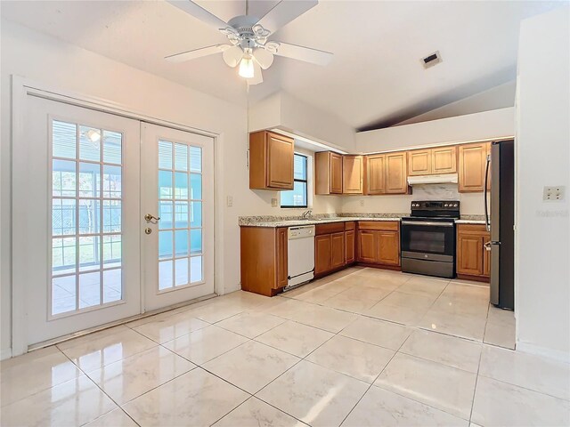 kitchen with ceiling fan, lofted ceiling, stainless steel appliances, and french doors