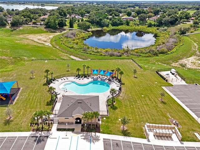 drone / aerial view with a water view