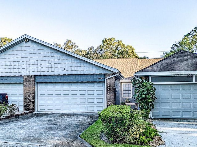 ranch-style home with a garage