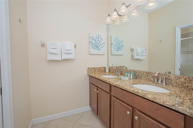 bathroom featuring a shower, vanity, and tile patterned floors