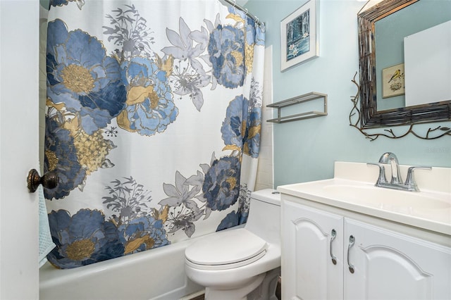 full bathroom with vanity, toilet, and shower / bath combo