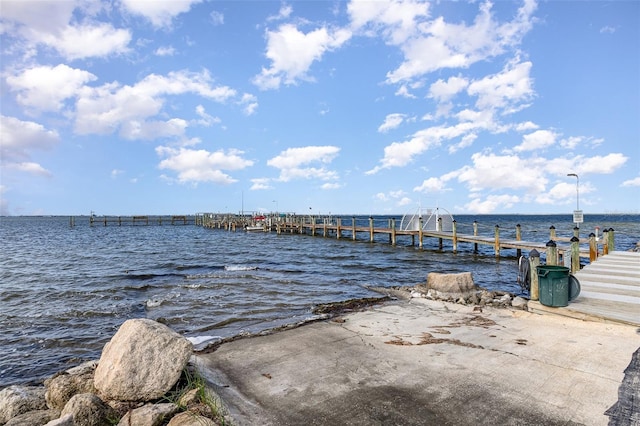 dock area with a water view