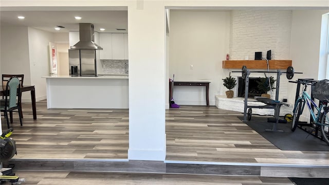 interior space with hardwood / wood-style flooring