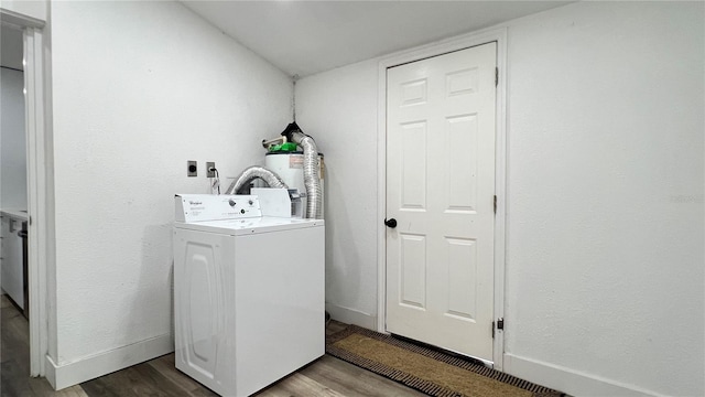 laundry area with washer / clothes dryer, water heater, and wood-type flooring