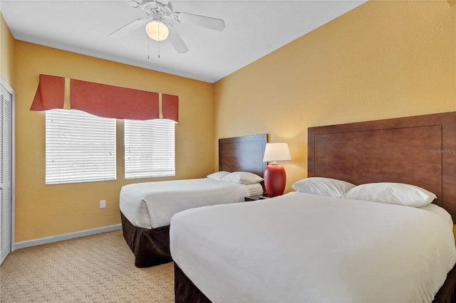 bedroom featuring carpet flooring and ceiling fan