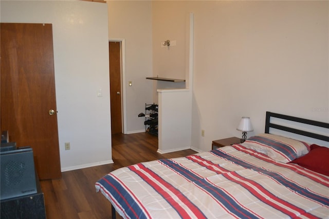 bedroom featuring dark hardwood / wood-style floors