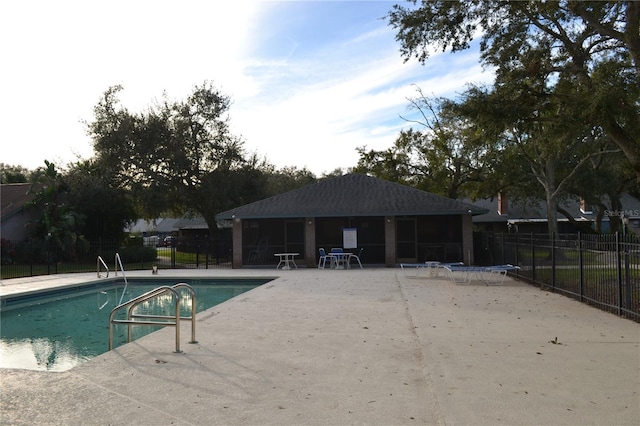 view of pool featuring a patio area