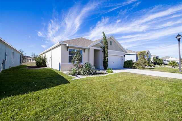 ranch-style home with concrete driveway, an attached garage, a front lawn, and stucco siding