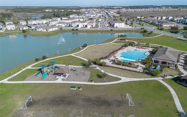 aerial view with a residential view and a water view