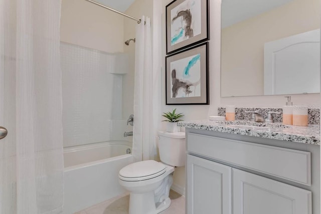 full bathroom with shower / tub combo, vanity, and toilet