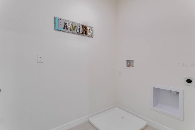 clothes washing area featuring tile patterned floors, electric dryer hookup, and hookup for a washing machine