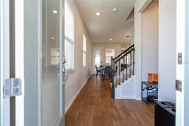 foyer entrance with hardwood / wood-style floors