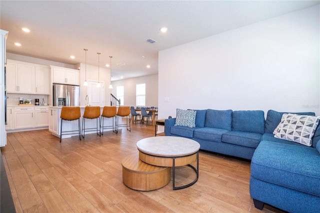 living room featuring light wood-type flooring