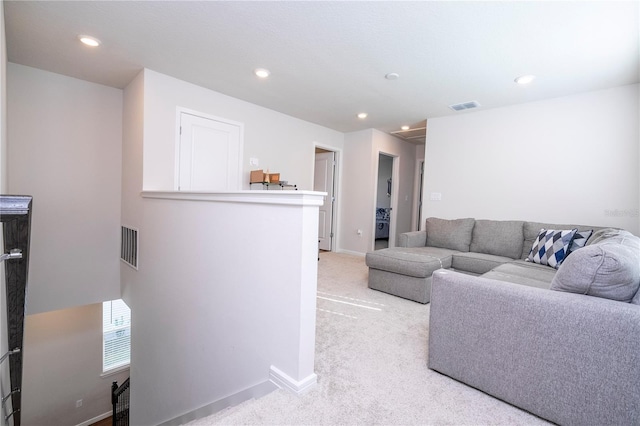 living room featuring light colored carpet