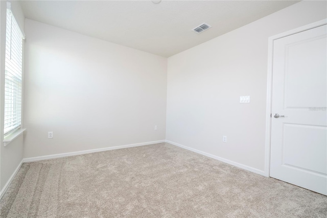 view of carpeted spare room