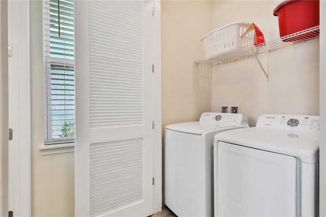 laundry area featuring washing machine and dryer