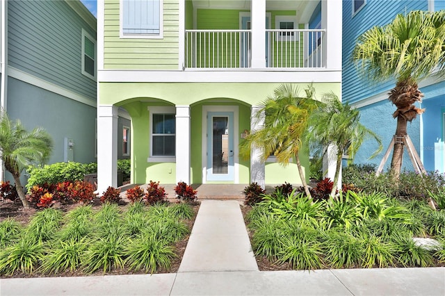 doorway to property featuring a balcony