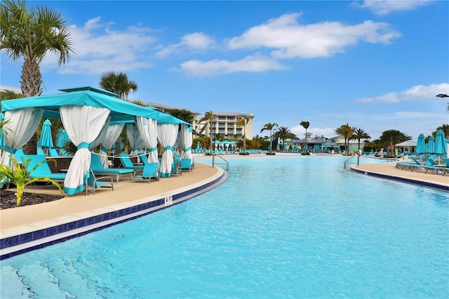 view of swimming pool featuring a patio