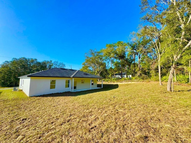 exterior space with a yard