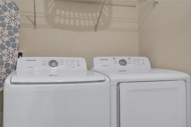 laundry room featuring independent washer and dryer