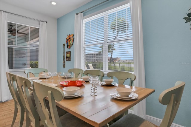 dining room with light wood-type flooring