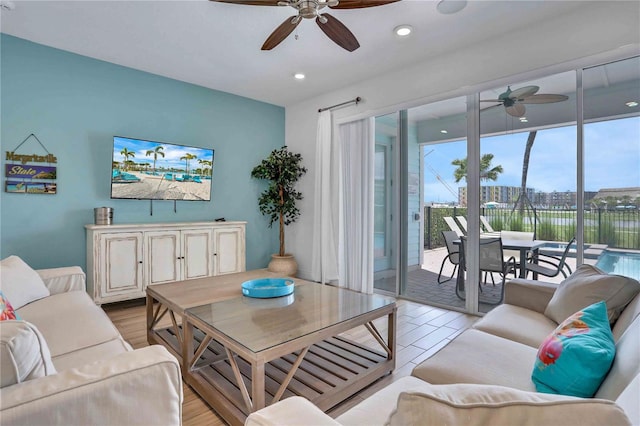 living room with ceiling fan