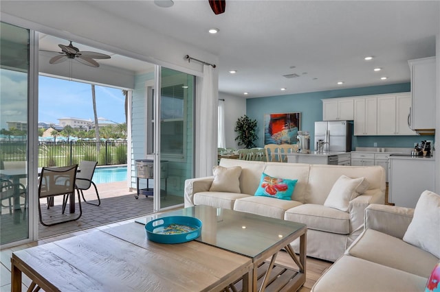 living room featuring ceiling fan