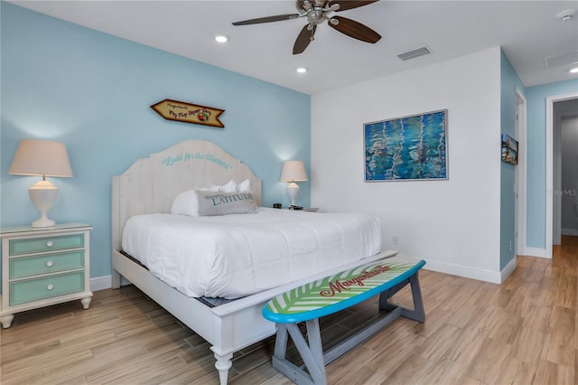 bedroom featuring ceiling fan and light hardwood / wood-style flooring