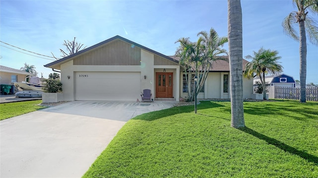 single story home with a garage and a front yard