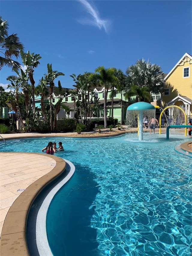 view of pool featuring pool water feature