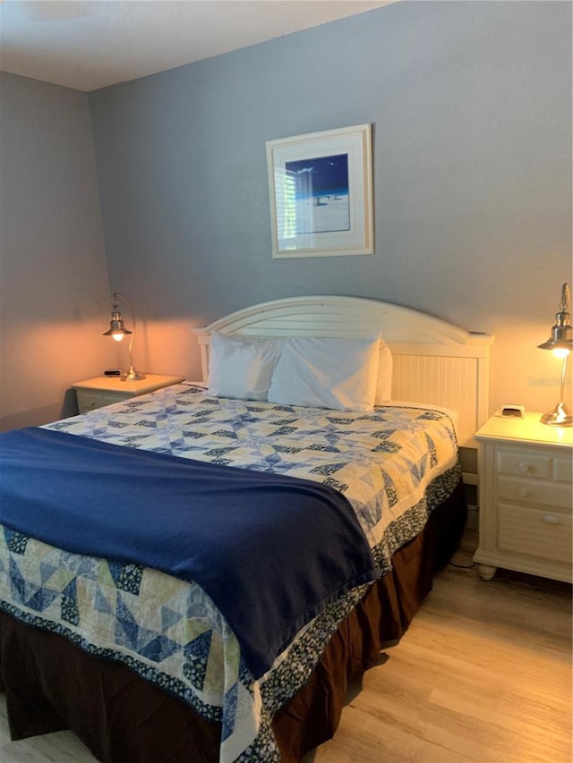 bedroom featuring light wood-type flooring