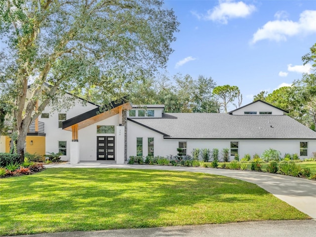 view of front of home with a front lawn