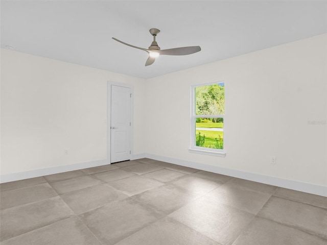 unfurnished room featuring ceiling fan