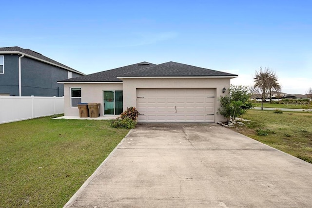 view of front facade featuring a front lawn and a garage