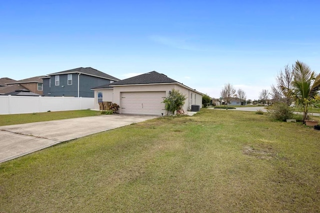 view of home's exterior with a lawn, central AC, and a garage