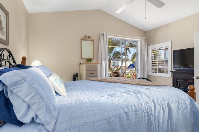 bedroom with access to outside, ceiling fan, and vaulted ceiling