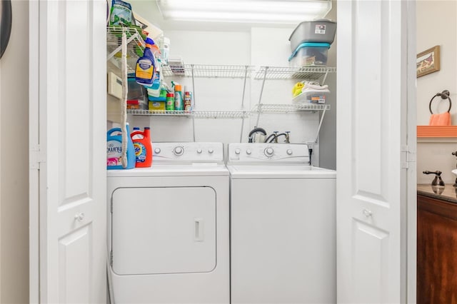 laundry room featuring separate washer and dryer