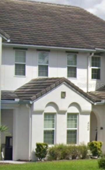 view of property exterior with stucco siding