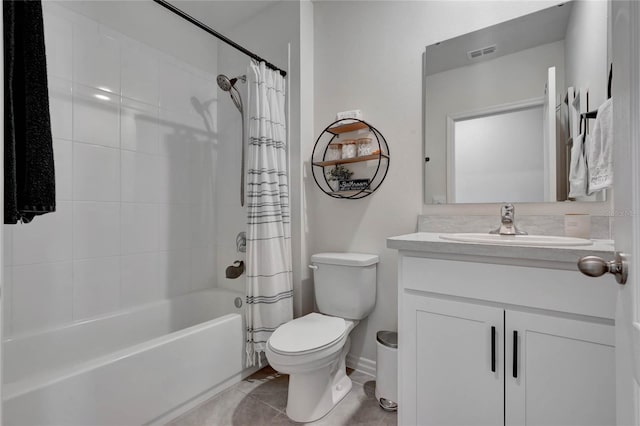 full bathroom featuring tile patterned floors, vanity, toilet, and shower / bathtub combination with curtain