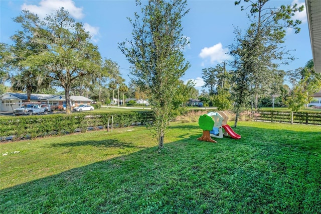 view of yard featuring a playground