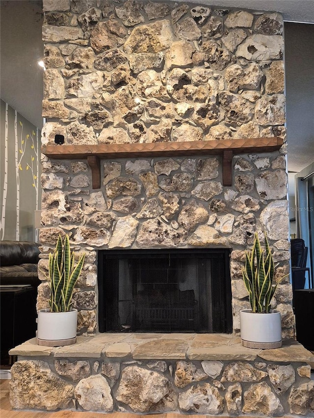 room details with a stone fireplace