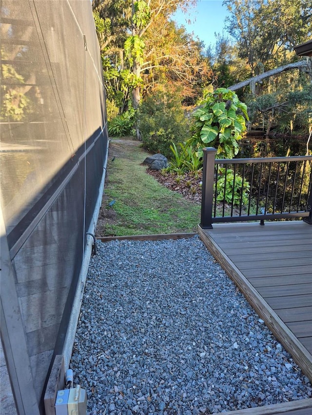 view of yard with a wooden deck