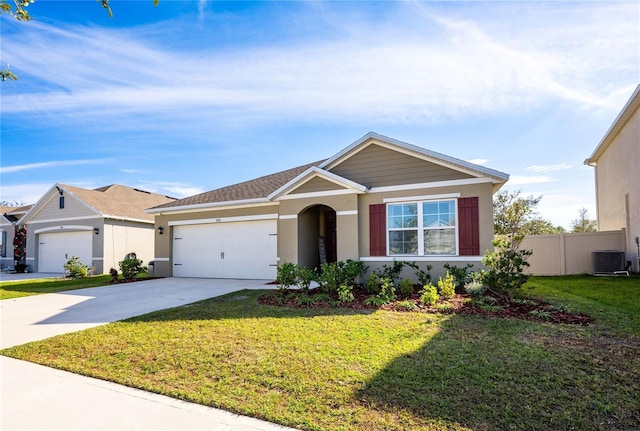 ranch-style house with a front yard, a garage, and cooling unit