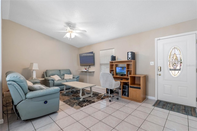 tiled office with ceiling fan and a wealth of natural light