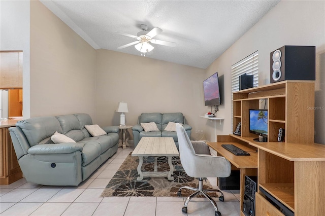 tiled office space with ceiling fan, lofted ceiling, and a textured ceiling