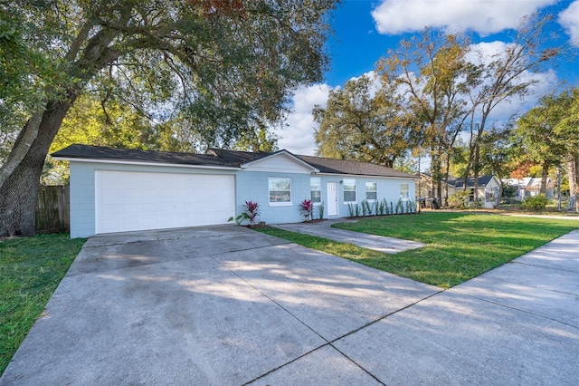 single story home with a front lawn and a garage