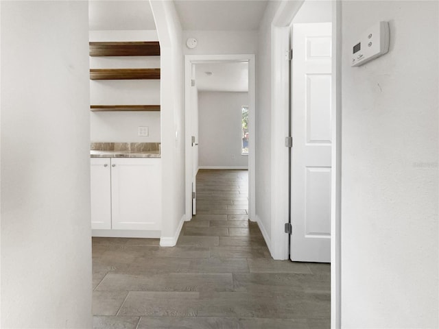 corridor featuring light hardwood / wood-style floors