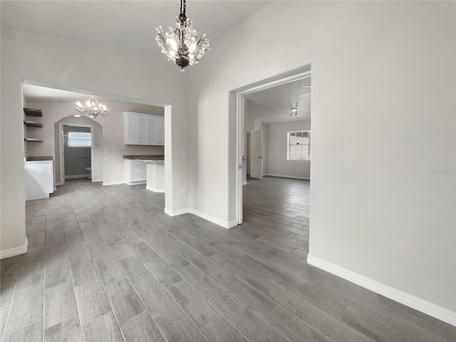 interior space with a chandelier and light hardwood / wood-style flooring