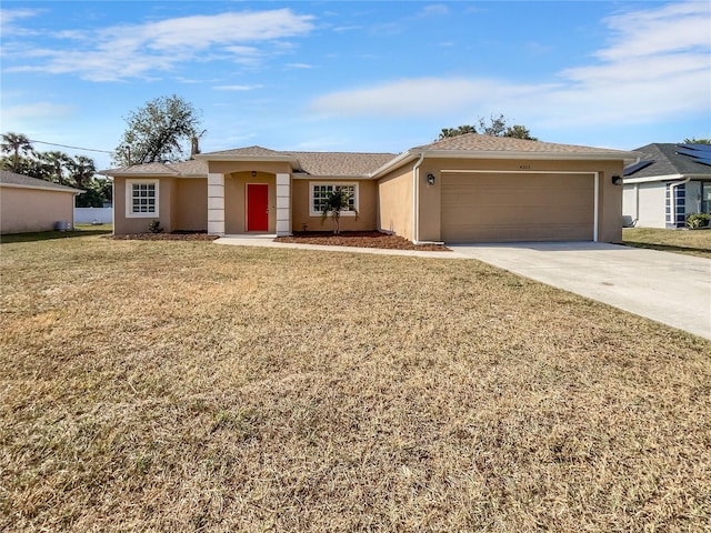 ranch-style home with a front lawn and a garage